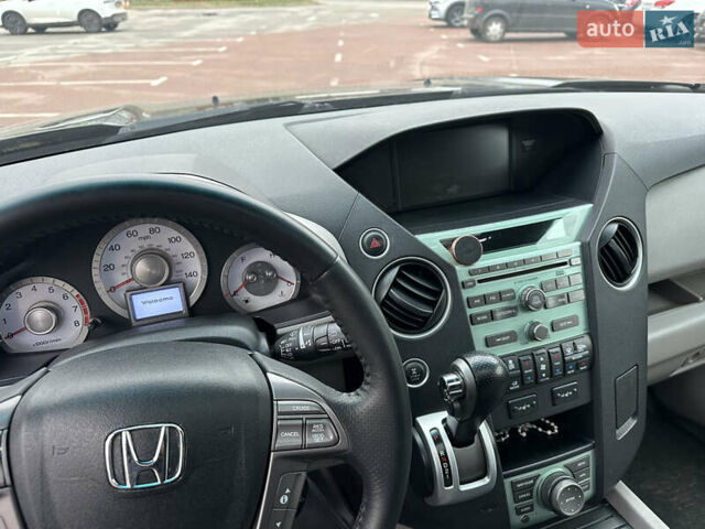 Чорний Хонда Пілот, об'ємом двигуна 3.47 л та пробігом 180 тис. км за 8950 $, фото 33 на Automoto.ua