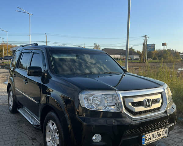 Черный Хонда Пилот, объемом двигателя 3.47 л и пробегом 251 тыс. км за 10500 $, фото 4 на Automoto.ua