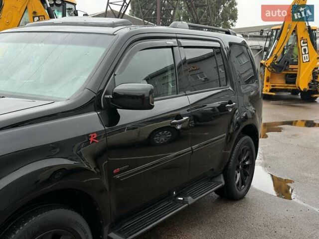 Чорний Хонда Пілот, об'ємом двигуна 3.5 л та пробігом 323 тис. км за 12500 $, фото 4 на Automoto.ua