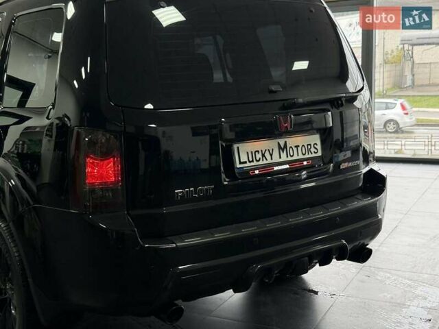 Черный Хонда Пилот, объемом двигателя 3.5 л и пробегом 323 тыс. км за 12950 $, фото 1 на Automoto.ua