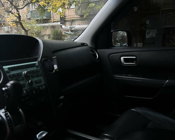 Черный Хонда Пилот, объемом двигателя 3.47 л и пробегом 251 тыс. км за 10500 $, фото 21 на Automoto.ua