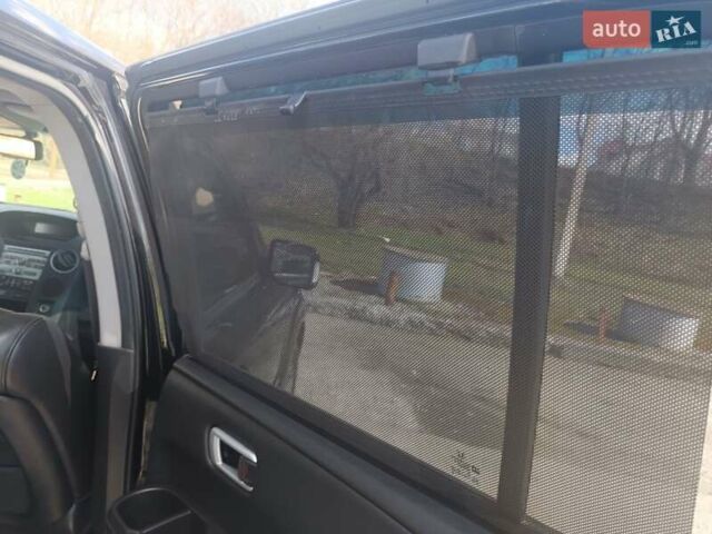 Черный Хонда Пилот, объемом двигателя 3.47 л и пробегом 260 тыс. км за 9000 $, фото 9 на Automoto.ua