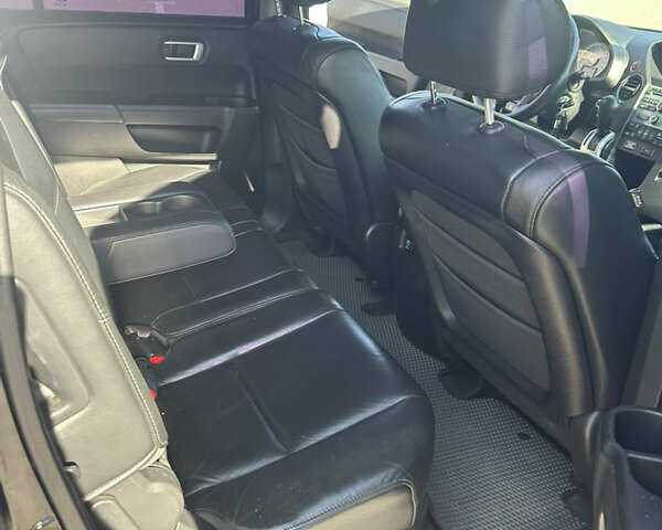 Чорний Хонда Пілот, об'ємом двигуна 3.47 л та пробігом 307 тис. км за 12200 $, фото 12 на Automoto.ua