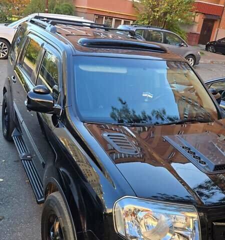 Чорний Хонда Пілот, об'ємом двигуна 3.5 л та пробігом 340 тис. км за 14000 $, фото 8 на Automoto.ua