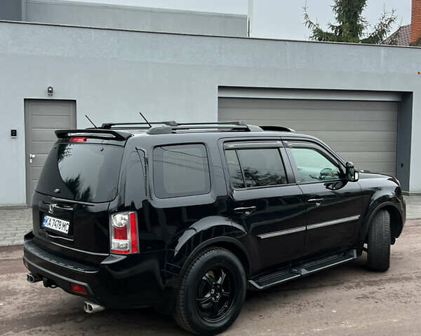 Чорний Хонда Пілот, об'ємом двигуна 3.5 л та пробігом 345 тис. км за 14000 $, фото 30 на Automoto.ua