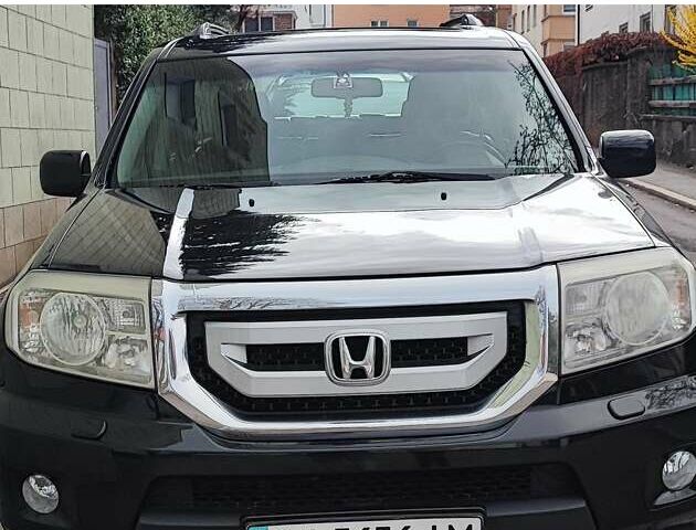 Черный Хонда Пилот, объемом двигателя 3.5 л и пробегом 244 тыс. км за 9200 $, фото 1 на Automoto.ua