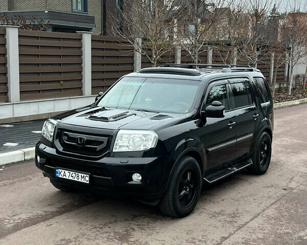 Чорний Хонда Пілот, об'ємом двигуна 3.5 л та пробігом 345 тис. км за 14000 $, фото 4 на Automoto.ua