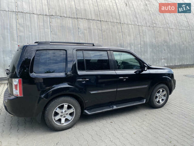 Чорний Хонда Пілот, об'ємом двигуна 3.5 л та пробігом 330 тис. км за 11900 $, фото 4 на Automoto.ua