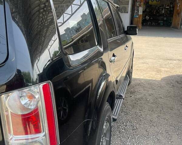 Чорний Хонда Пілот, об'ємом двигуна 0 л та пробігом 162 тис. км за 15000 $, фото 4 на Automoto.ua