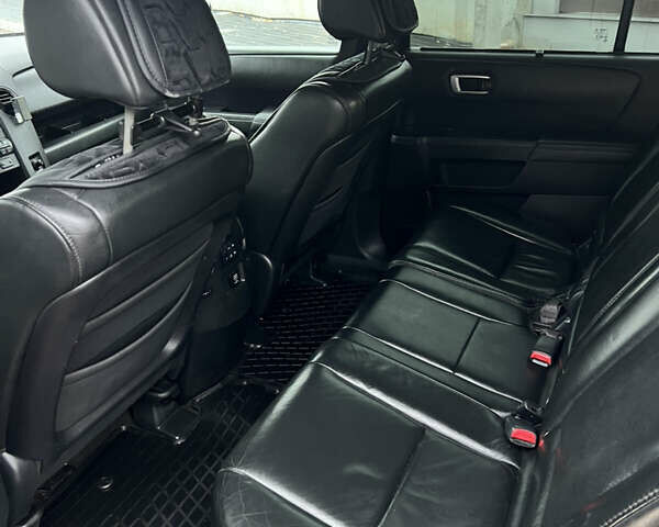 Чорний Хонда Пілот, об'ємом двигуна 3.5 л та пробігом 345 тис. км за 14000 $, фото 39 на Automoto.ua