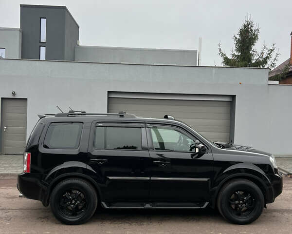 Чорний Хонда Пілот, об'ємом двигуна 3.5 л та пробігом 345 тис. км за 14000 $, фото 13 на Automoto.ua