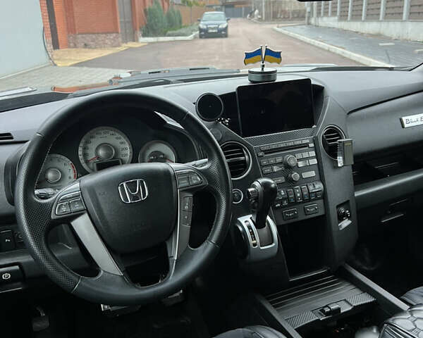 Чорний Хонда Пілот, об'ємом двигуна 3.5 л та пробігом 345 тис. км за 14000 $, фото 34 на Automoto.ua