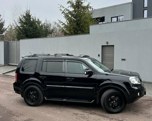 Чорний Хонда Пілот, об'ємом двигуна 3.5 л та пробігом 345 тис. км за 14000 $, фото 31 на Automoto.ua