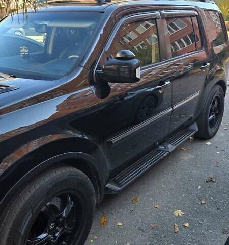 Чорний Хонда Пілот, об'ємом двигуна 3.5 л та пробігом 340 тис. км за 14000 $, фото 9 на Automoto.ua