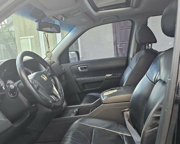 Чорний Хонда Пілот, об'ємом двигуна 3.5 л та пробігом 187 тис. км за 9800 $, фото 14 на Automoto.ua