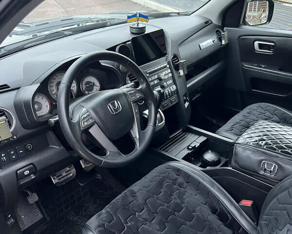 Чорний Хонда Пілот, об'ємом двигуна 3.5 л та пробігом 345 тис. км за 14000 $, фото 33 на Automoto.ua