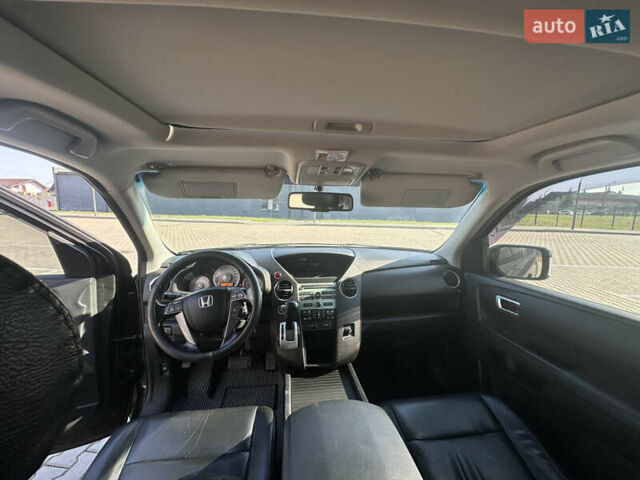 Чорний Хонда Пілот, об'ємом двигуна 3.47 л та пробігом 307 тис. км за 12200 $, фото 14 на Automoto.ua