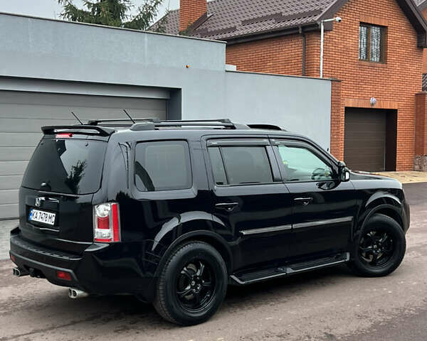 Чорний Хонда Пілот, об'ємом двигуна 3.5 л та пробігом 345 тис. км за 14000 $, фото 27 на Automoto.ua