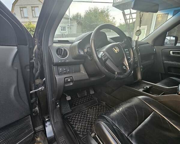 Чорний Хонда Пілот, об'ємом двигуна 3.5 л та пробігом 187 тис. км за 9800 $, фото 6 на Automoto.ua