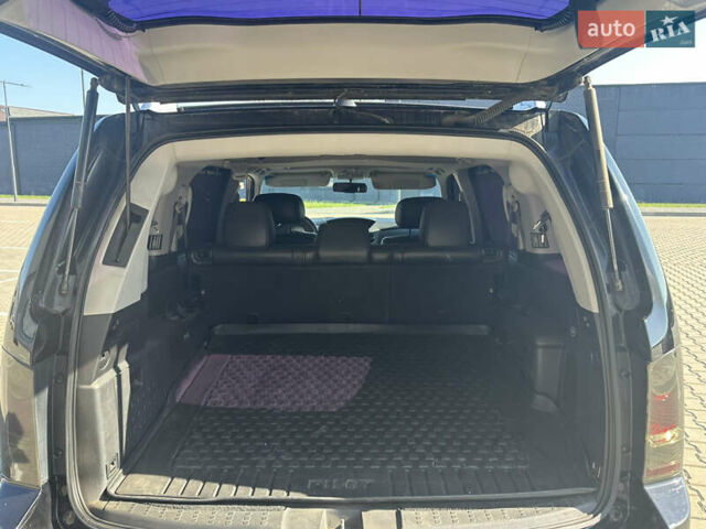 Чорний Хонда Пілот, об'ємом двигуна 3.47 л та пробігом 307 тис. км за 12200 $, фото 13 на Automoto.ua