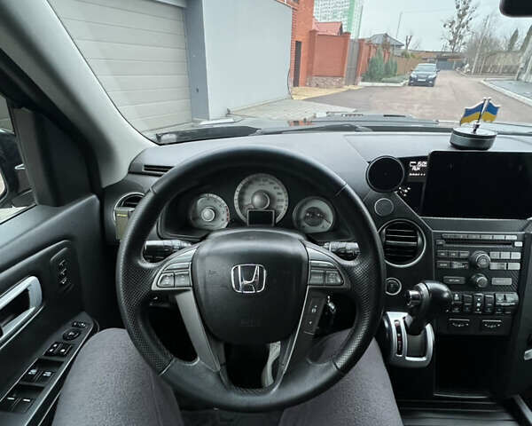 Чорний Хонда Пілот, об'ємом двигуна 3.5 л та пробігом 345 тис. км за 14000 $, фото 37 на Automoto.ua
