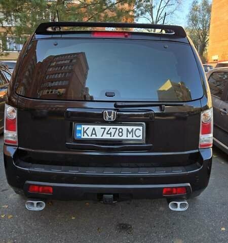 Чорний Хонда Пілот, об'ємом двигуна 3.5 л та пробігом 340 тис. км за 14000 $, фото 6 на Automoto.ua