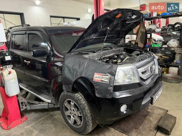 Черный Хонда Пилот, объемом двигателя 3.47 л и пробегом 260 тыс. км за 9000 $, фото 42 на Automoto.ua