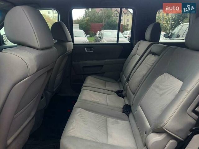 Хонда Пілот 2011 у Рівному на Automoto.ua Чорний Хонда Пілот, об'ємом двигуна 3.5 л та пробігом 230 тис. км за 11300 $, фото 12 на Automoto.ua