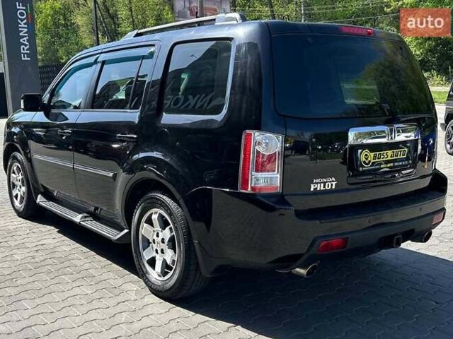 Чорний Хонда Пілот, об'ємом двигуна 3.47 л та пробігом 331 тис. км за 13700 $, фото 3 на Automoto.ua
