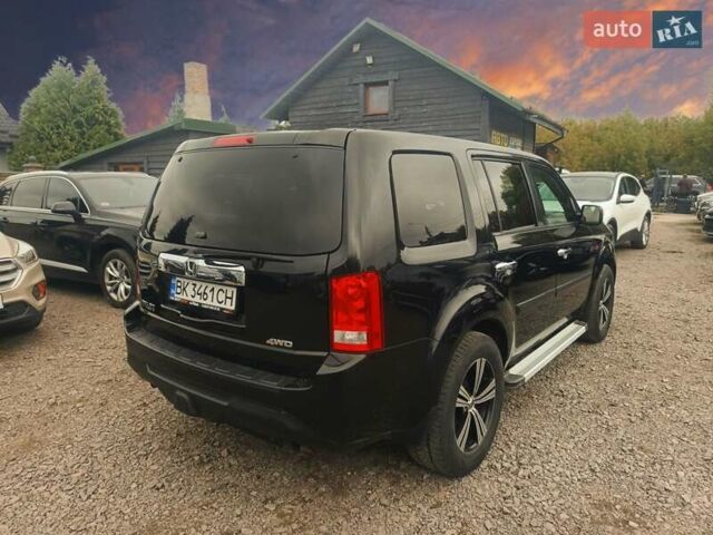 Хонда Пілот 2011 у Рівному на Automoto.ua Чорний Хонда Пілот, об'ємом двигуна 3.5 л та пробігом 230 тис. км за 11300 $, фото 6 на Automoto.ua