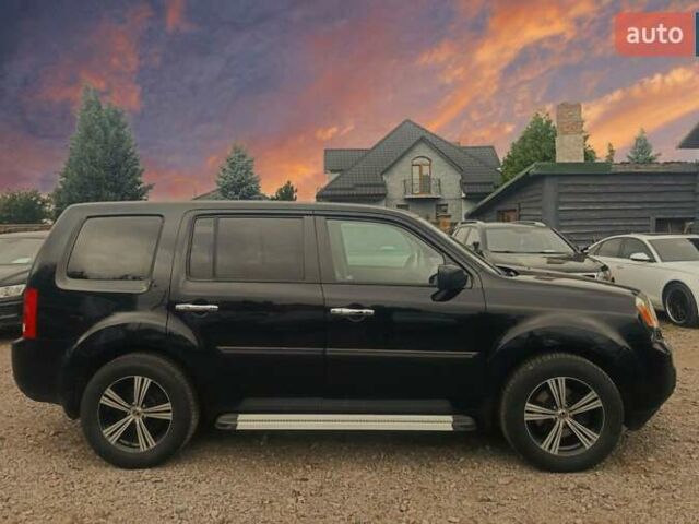 Хонда Пілот 2011 у Рівному на Automoto.ua Чорний Хонда Пілот, об'ємом двигуна 3.5 л та пробігом 230 тис. км за 11300 $, фото 4 на Automoto.ua