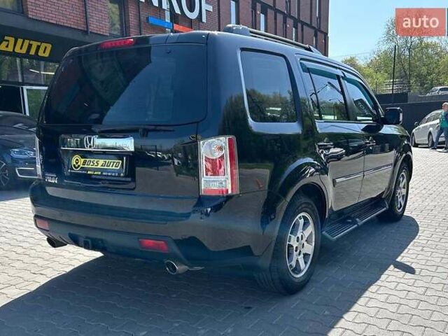 Чорний Хонда Пілот, об'ємом двигуна 3.47 л та пробігом 331 тис. км за 13700 $, фото 5 на Automoto.ua