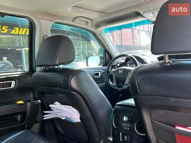 Чорний Хонда Пілот, об'ємом двигуна 3.47 л та пробігом 331 тис. км за 13700 $, фото 16 на Automoto.ua