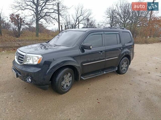 Чорний Хонда Пілот, об'ємом двигуна 3.47 л та пробігом 242 тис. км за 11500 $, фото 1 на Automoto.ua