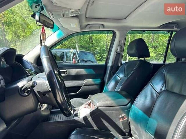 Чорний Хонда Пілот, об'ємом двигуна 3.47 л та пробігом 331 тис. км за 13700 $, фото 9 на Automoto.ua