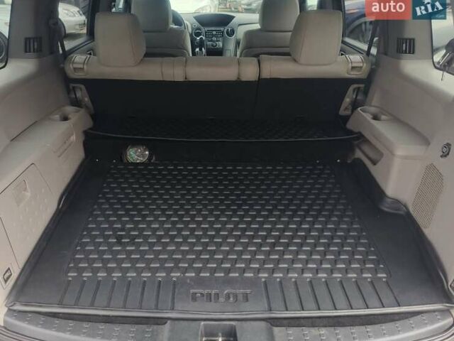 Хонда Пілот 2011 у Рівному на Automoto.ua Чорний Хонда Пілот, об'ємом двигуна 3.5 л та пробігом 230 тис. км за 11300 $, фото 13 на Automoto.ua