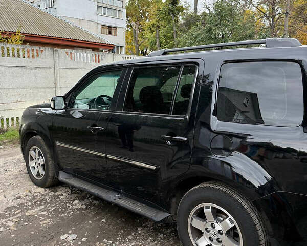 Черный Хонда Пилот, объемом двигателя 3.47 л и пробегом 138 тыс. км за 15500 $, фото 5 на Automoto.ua