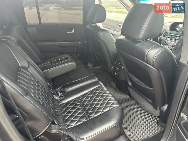 Черный Хонда Пилот, объемом двигателя 3.47 л и пробегом 210 тыс. км за 12500 $, фото 6 на Automoto.ua