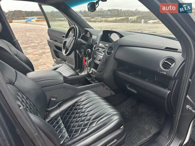 Черный Хонда Пилот, объемом двигателя 3.47 л и пробегом 210 тыс. км за 12500 $, фото 5 на Automoto.ua