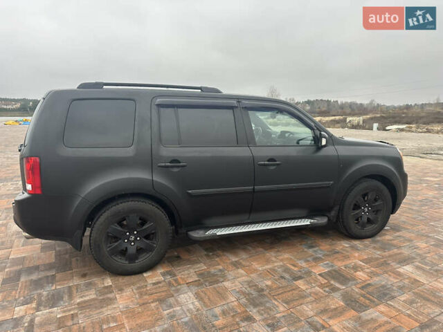 Черный Хонда Пилот, объемом двигателя 3.47 л и пробегом 210 тыс. км за 12500 $, фото 3 на Automoto.ua