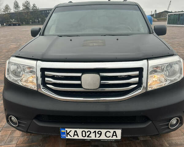 Черный Хонда Пилот, объемом двигателя 3.47 л и пробегом 210 тыс. км за 12500 $, фото 1 на Automoto.ua