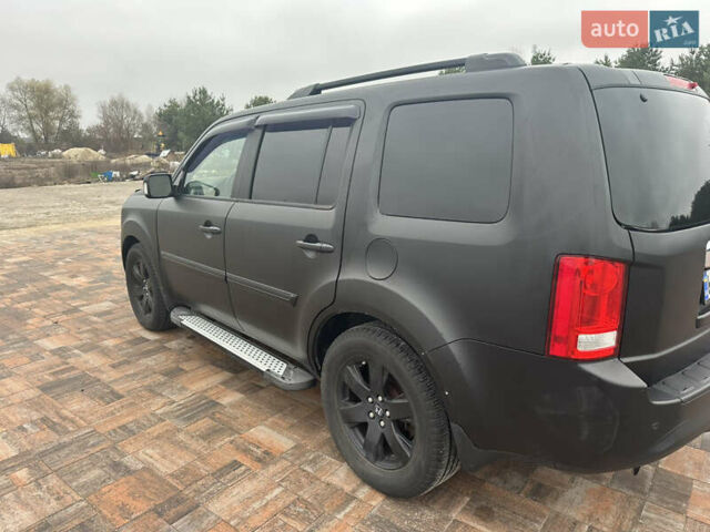 Черный Хонда Пилот, объемом двигателя 3.47 л и пробегом 210 тыс. км за 12500 $, фото 13 на Automoto.ua