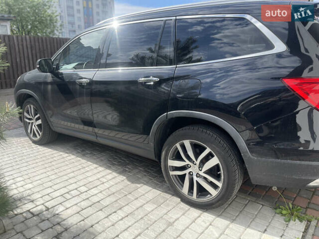 Чорний Хонда Пілот, об'ємом двигуна 3.47 л та пробігом 188 тис. км за 24800 $, фото 4 на Automoto.ua