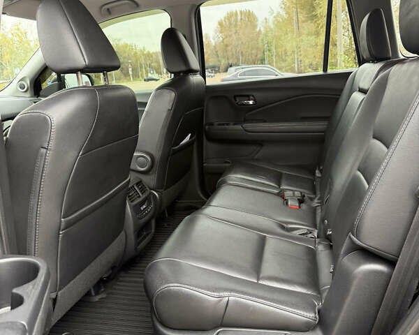 Черный Хонда Пилот, объемом двигателя 3.47 л и пробегом 162 тыс. км за 22000 $, фото 10 на Automoto.ua