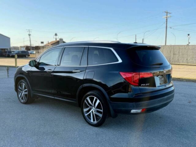 Черный Хонда Пилот, объемом двигателя 3.5 л и пробегом 62 тыс. км за 11000 $, фото 5 на Automoto.ua