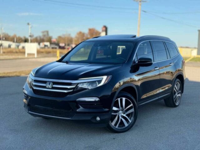 Черный Хонда Пилот, объемом двигателя 3.5 л и пробегом 62 тыс. км за 11000 $, фото 2 на Automoto.ua