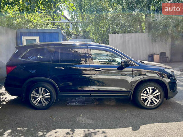 Черный Хонда Пилот, объемом двигателя 3 л и пробегом 192 тыс. км за 23499 $, фото 4 на Automoto.ua