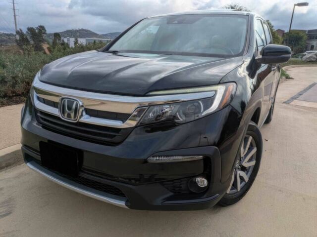 Чорний Хонда Пілот, об'ємом двигуна 3.5 л та пробігом 38 тис. км за 18000 $, фото 2 на Automoto.ua