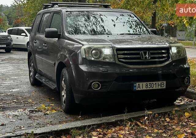 Коричневий Хонда Пілот, об'ємом двигуна 3.47 л та пробігом 187 тис. км за 14500 $, фото 9 на Automoto.ua