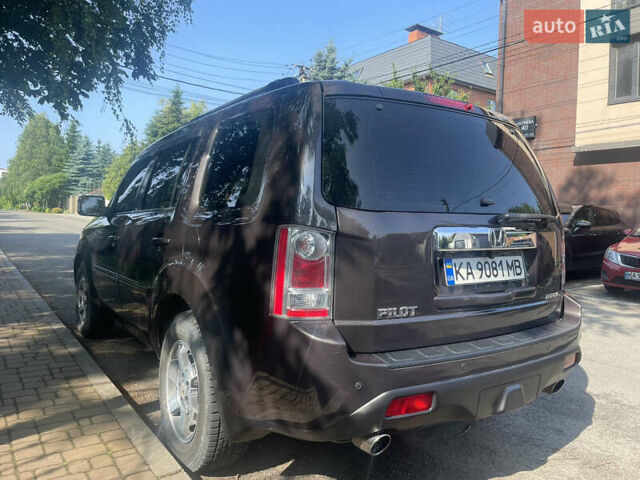 Коричневий Хонда Пілот, об'ємом двигуна 3.47 л та пробігом 298 тис. км за 14500 $, фото 4 на Automoto.ua